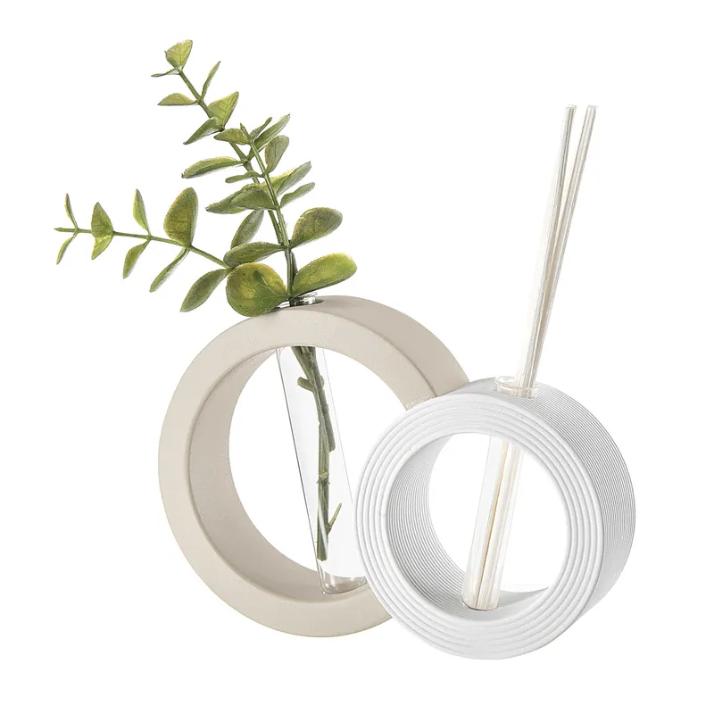Esclusivo Vaso rotondo con profumatore per ambienti dal design moderno ed elegante